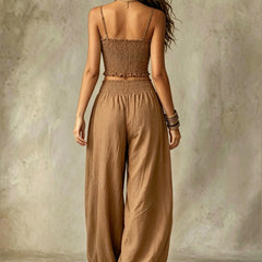 Smocked crop top and wide-leg pants set in khaki, open back with thin straps and gathers.