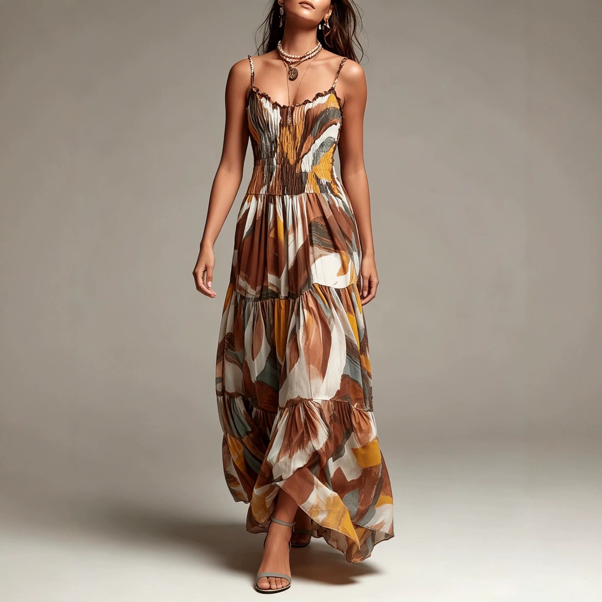 Abstract print smocked tiered maxi dress with flowing tiers and spaghetti straps