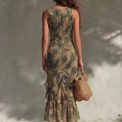 Back view of palm print maxi dress with ruched fit and layered ruffle hem