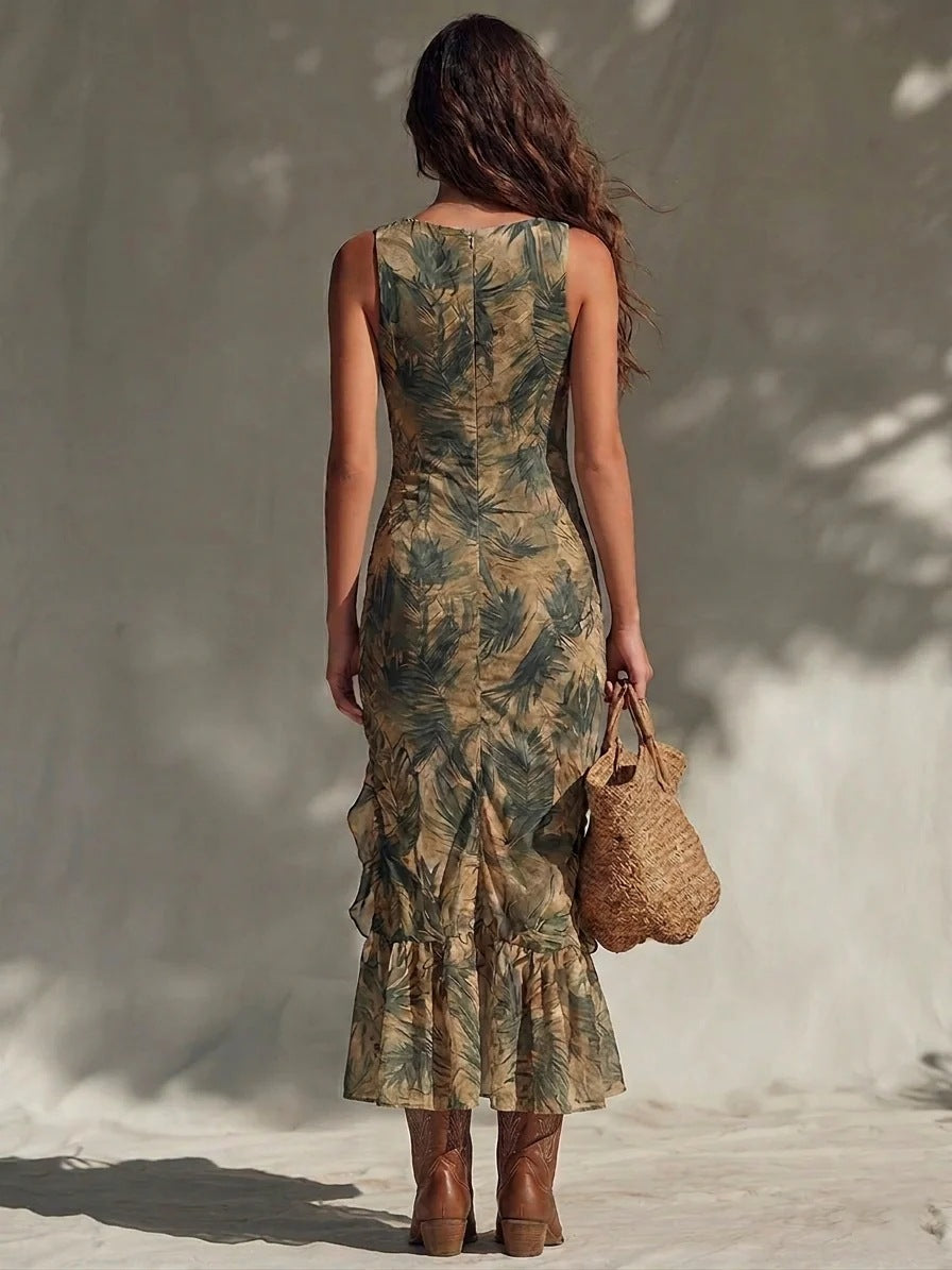 Back view of palm print maxi dress with ruched fit and layered ruffle hem