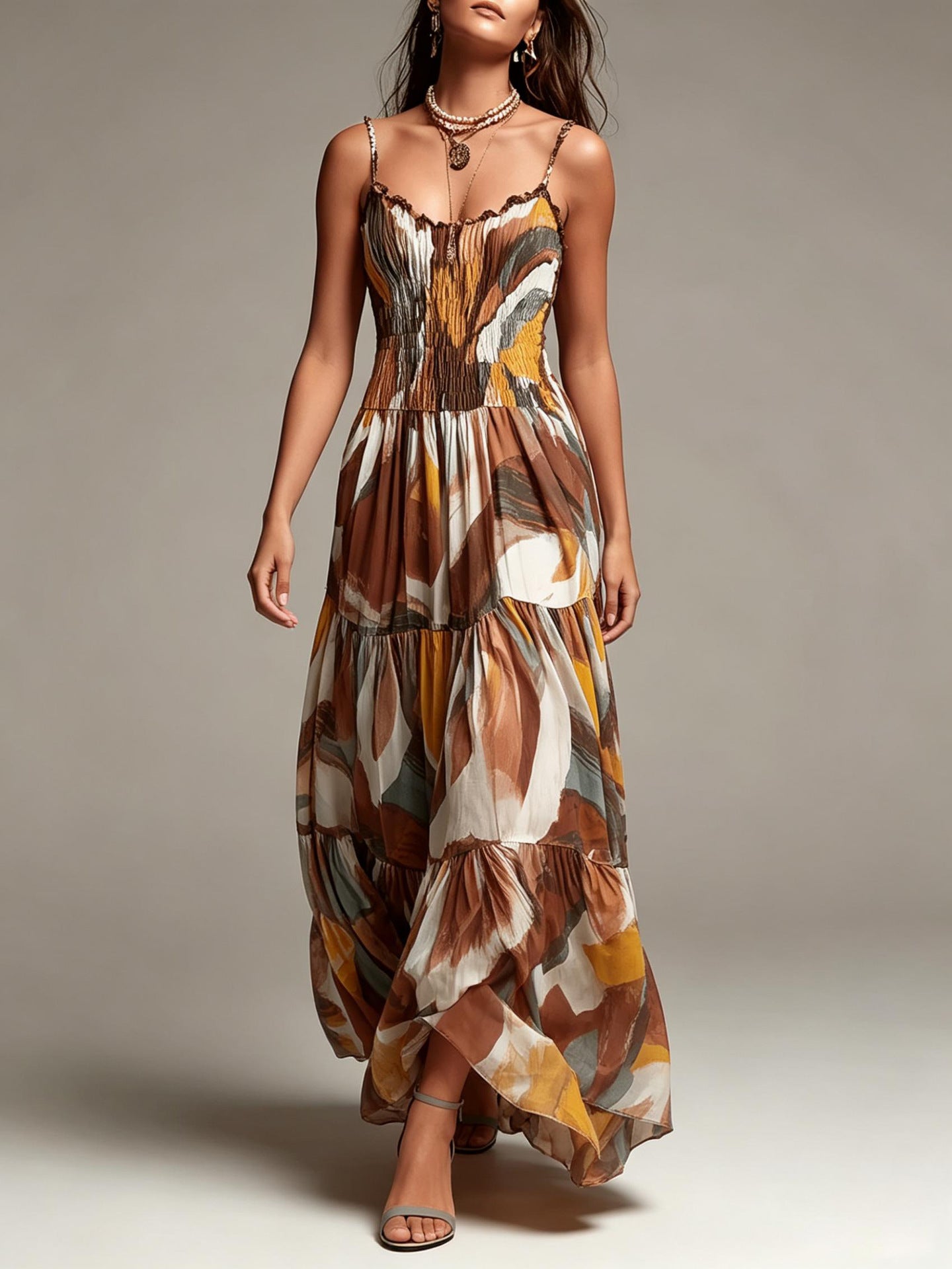 Abstract print smocked tiered maxi dress with scalloped neckline and spaghetti straps