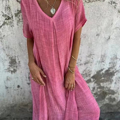 Abito rosa a V con maniche corte e patta frontale