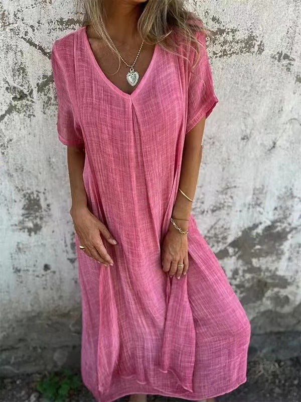 Abito rosa a V con maniche corte e patta frontale