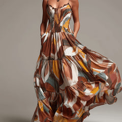 Abstract print smocked tiered maxi dress with spaghetti straps, flowing ruffle skirt