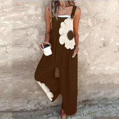 Brown sleeveless floral printed overalls with wide legs and large cream daisy
