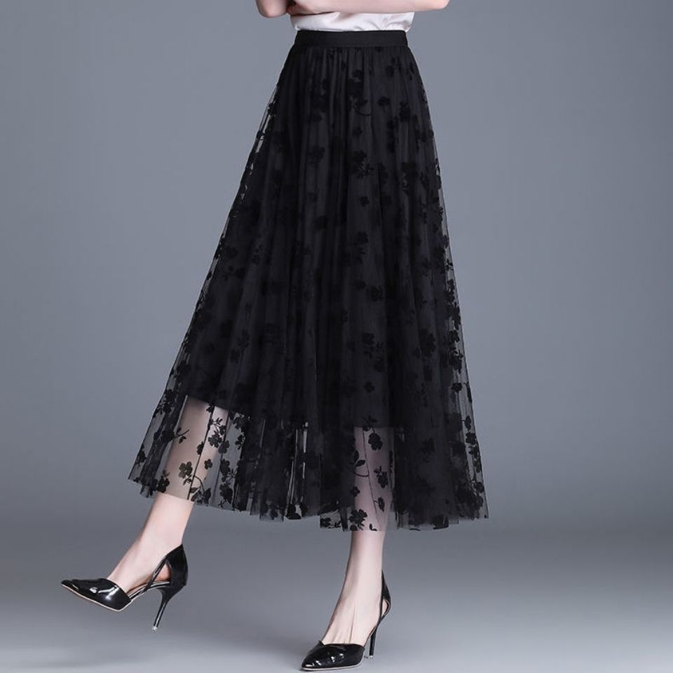 Black midi tulle skirt with sheer floral overlay and elastic waistband