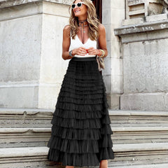 Black maxi layered cake skirt with tiered ruffle layers and gathered waistline