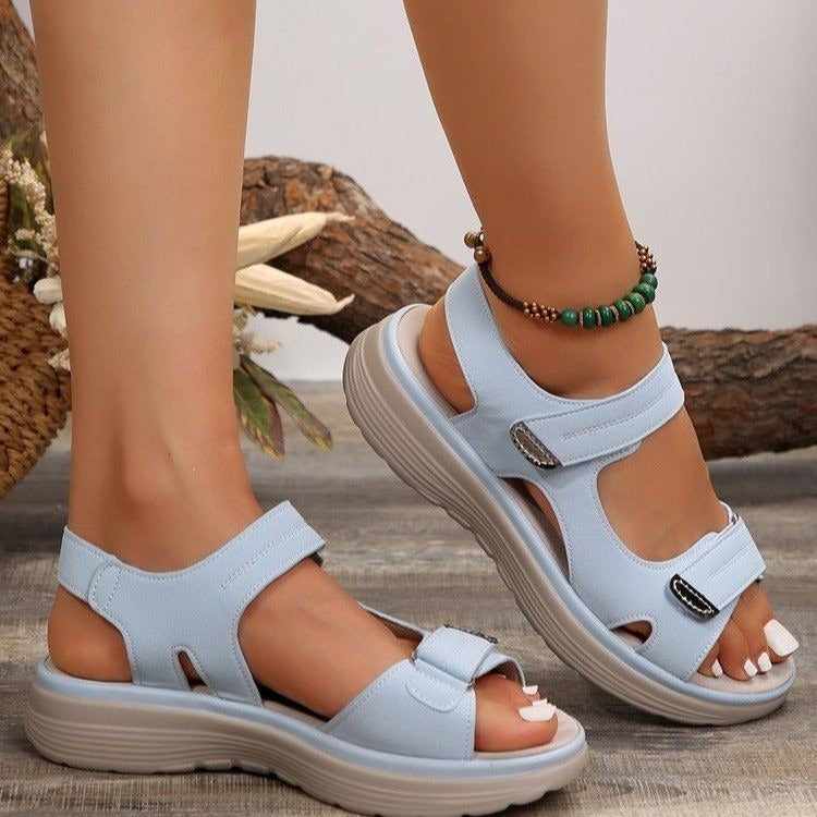 Light blue supportive orthopaedic sandals with two hook-and-loop straps and cushioned sole