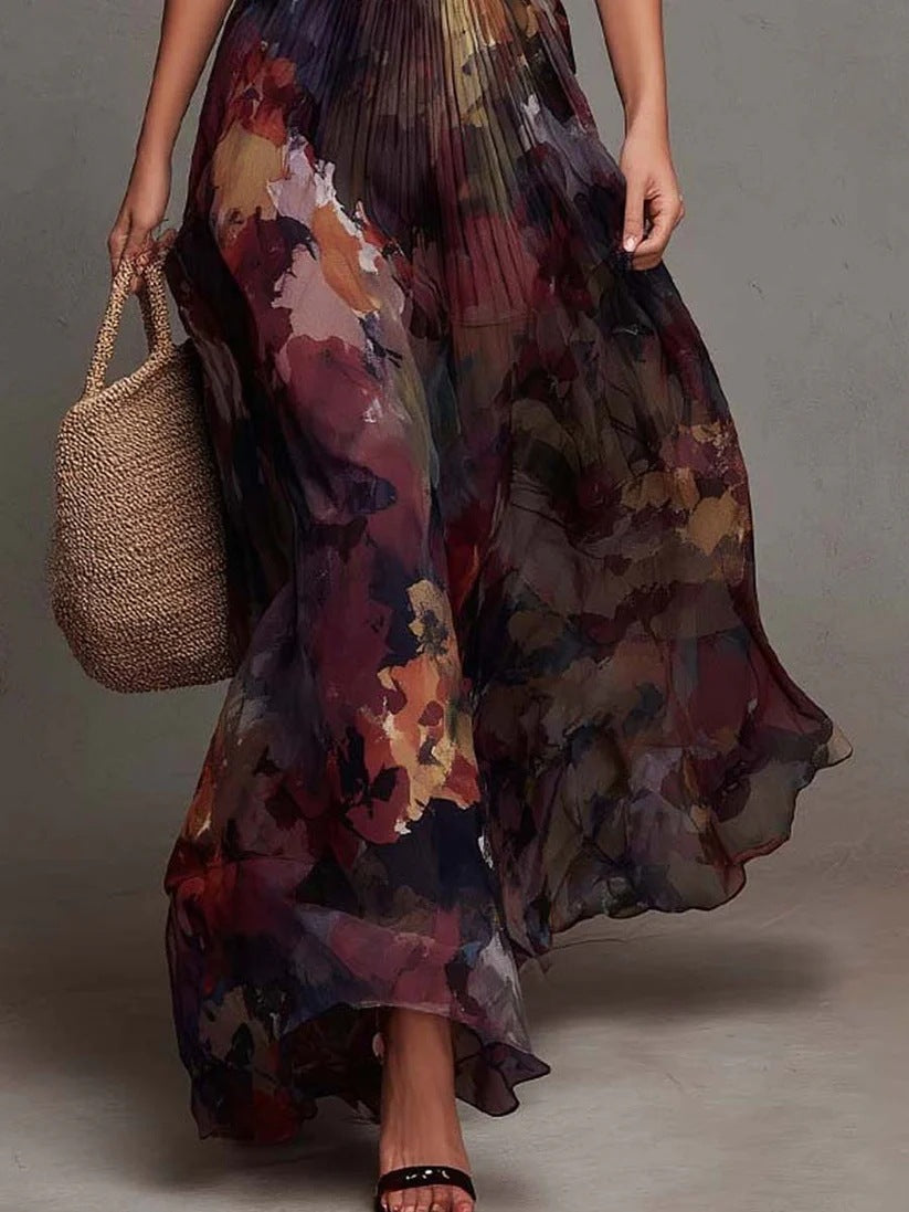 Pleated maxi skirt with watercolor floral print and flowing layered hem