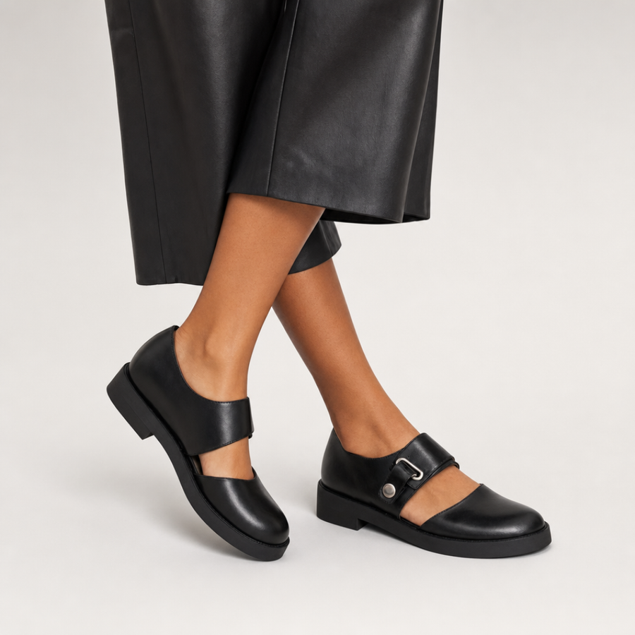 Scarpe slip-on eleganti nere con cinturino e fibbia metallica