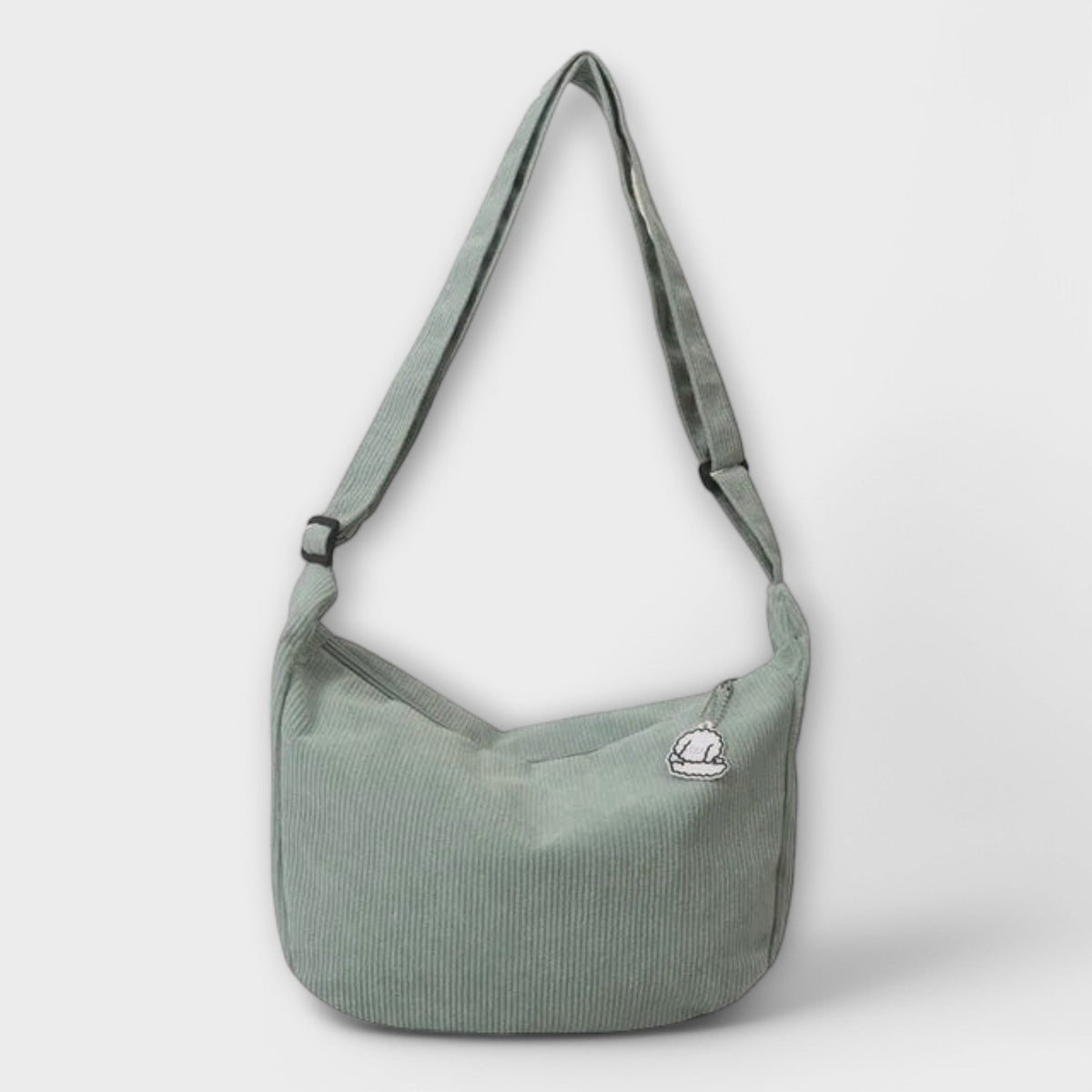 Alexa women’s shoulder bag, sage green corduroy hobo shape with cloud charm patch