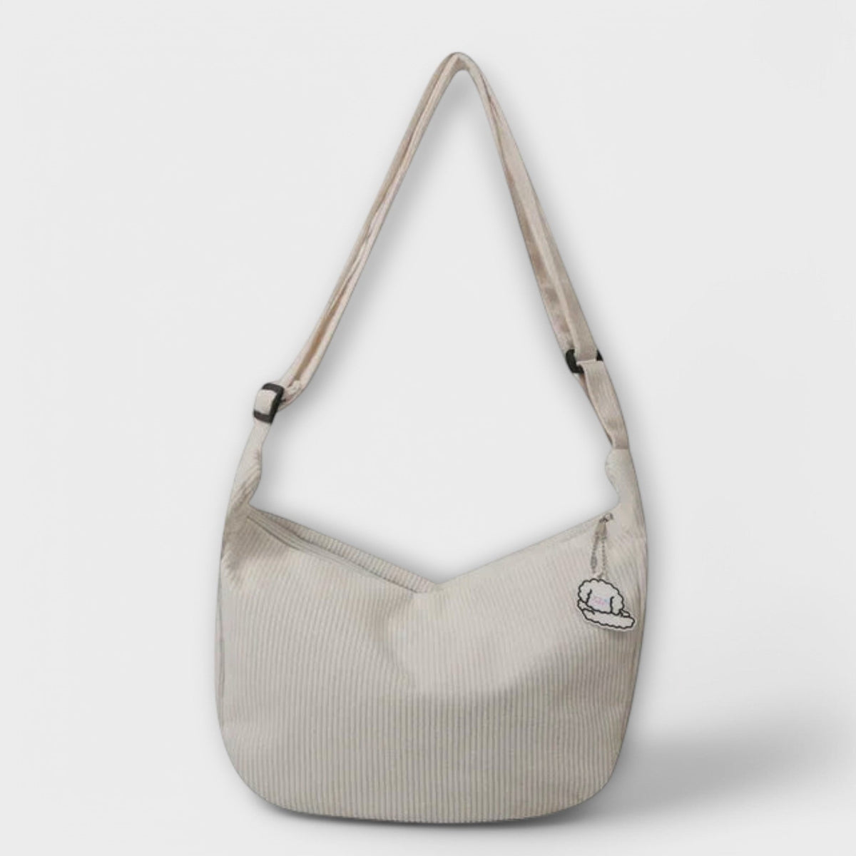 Alexa women’s shoulder bag, light beige corduroy hobo shape with cloud charm patch