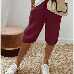 Lightweight summer shorts in wine red, cuffed hem and elastic waist with pockets