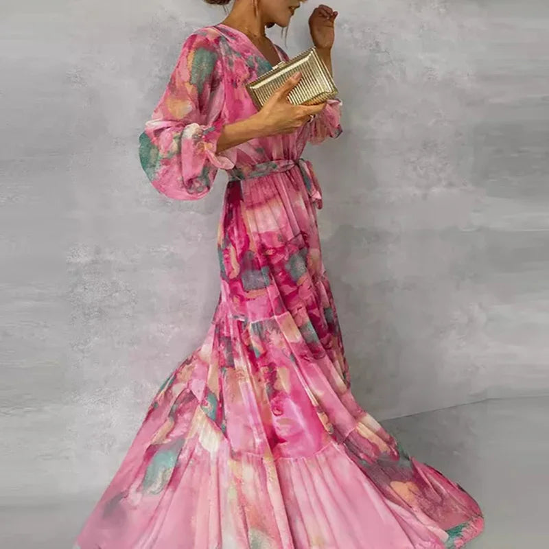 Floral maxi dress in pink with V-neck wrap, tiered skirt and long gathered puff sleeves