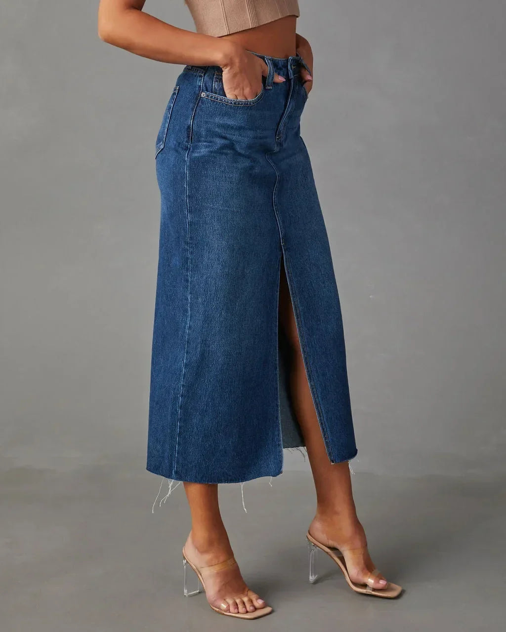 High-waist denim midi skirt with front slit, medium blue wash