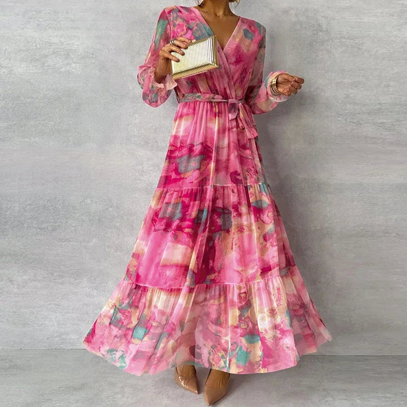 Floral tiered midi dress in pink with V-neck wrap, long puff sleeves, gathered waist
