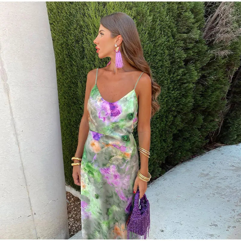 Green floral slip maxi dress with open back and thin straps, sleeveless
