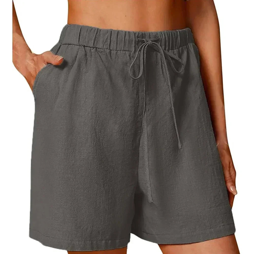 Pantaloni corti grigio scuro con vita elasticizzata e coulisse, tasche laterali