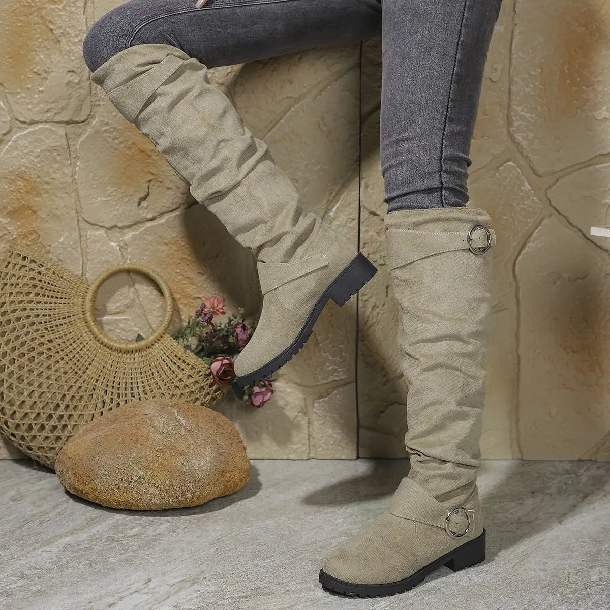 Knee-high khaki suede boots with buckle rings and chunky lug sole