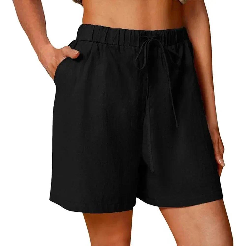 Pantaloni corti neri con vita elasticizzata e coulisse, tasche laterali