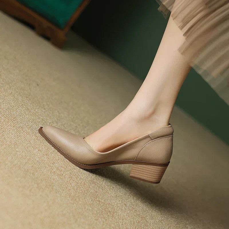 Brown mid-heeled loafers with almond toe and mid block heel