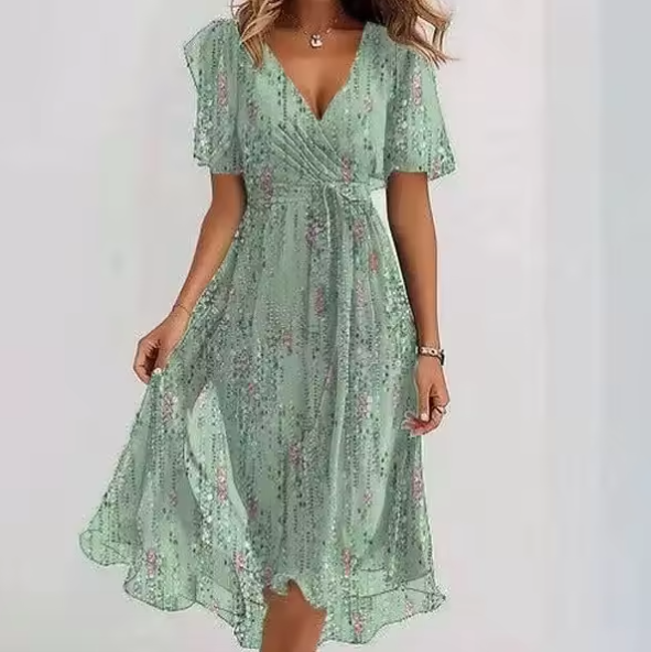 Vestito midi verde chiaro con scollatura a V, maniche corte e stampa floreale