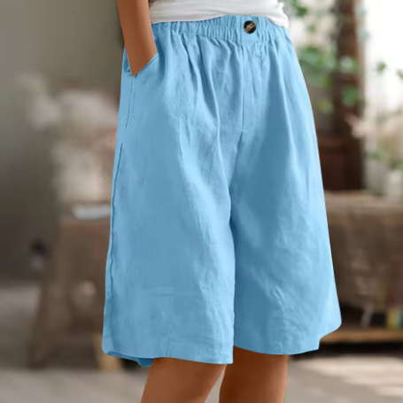 Pantaloni corti azzurri con vita elasticizzata e bottone, pieghe davanti