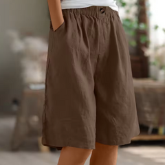 Pantaloni corti marroni con vita elastica, bottoncino e tasche laterali, gamba ampia