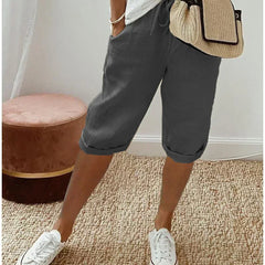 Lightweight summer shorts in dark gray, rolled cuffs, drawstring waist, side pockets.