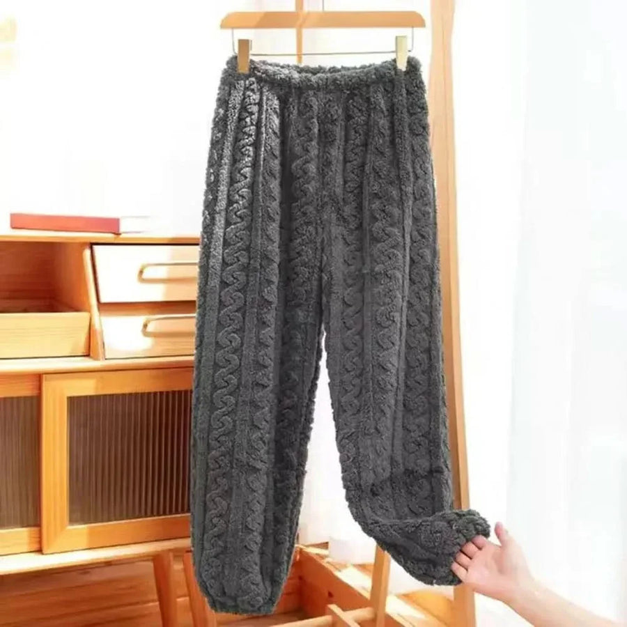Dark grey soft-lined cable knit pants with elastic waistband and relaxed straight legs