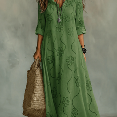 Vestito estivo lungo verde con maniche corte e scollo a V, motivo floreale