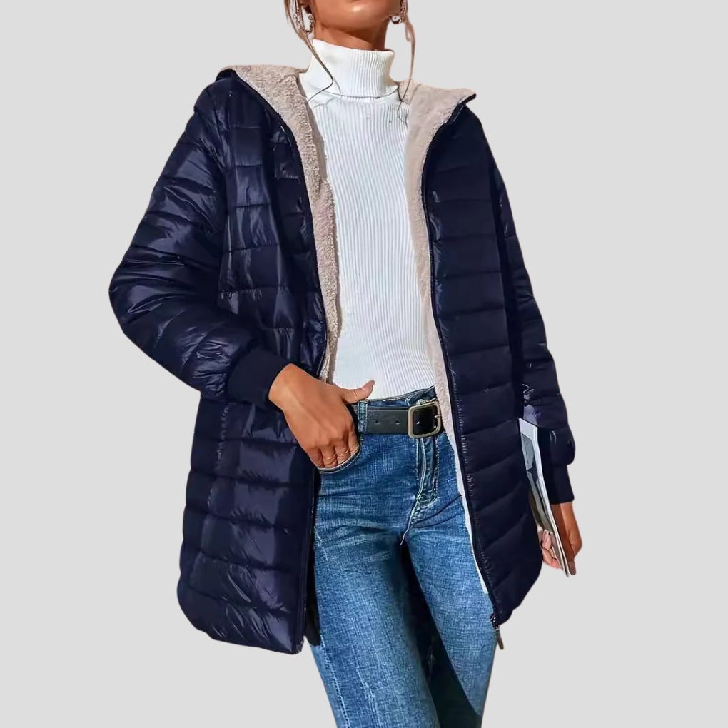 Hooded quilted puffer coat in navy with teddy-fleece lining, zip pockets, and hood.