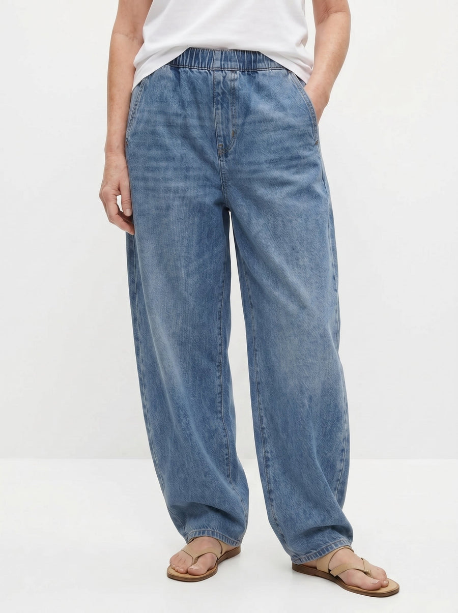 Blue relaxed elastic-waist denim trousers, wide-leg fit with side seam stitching