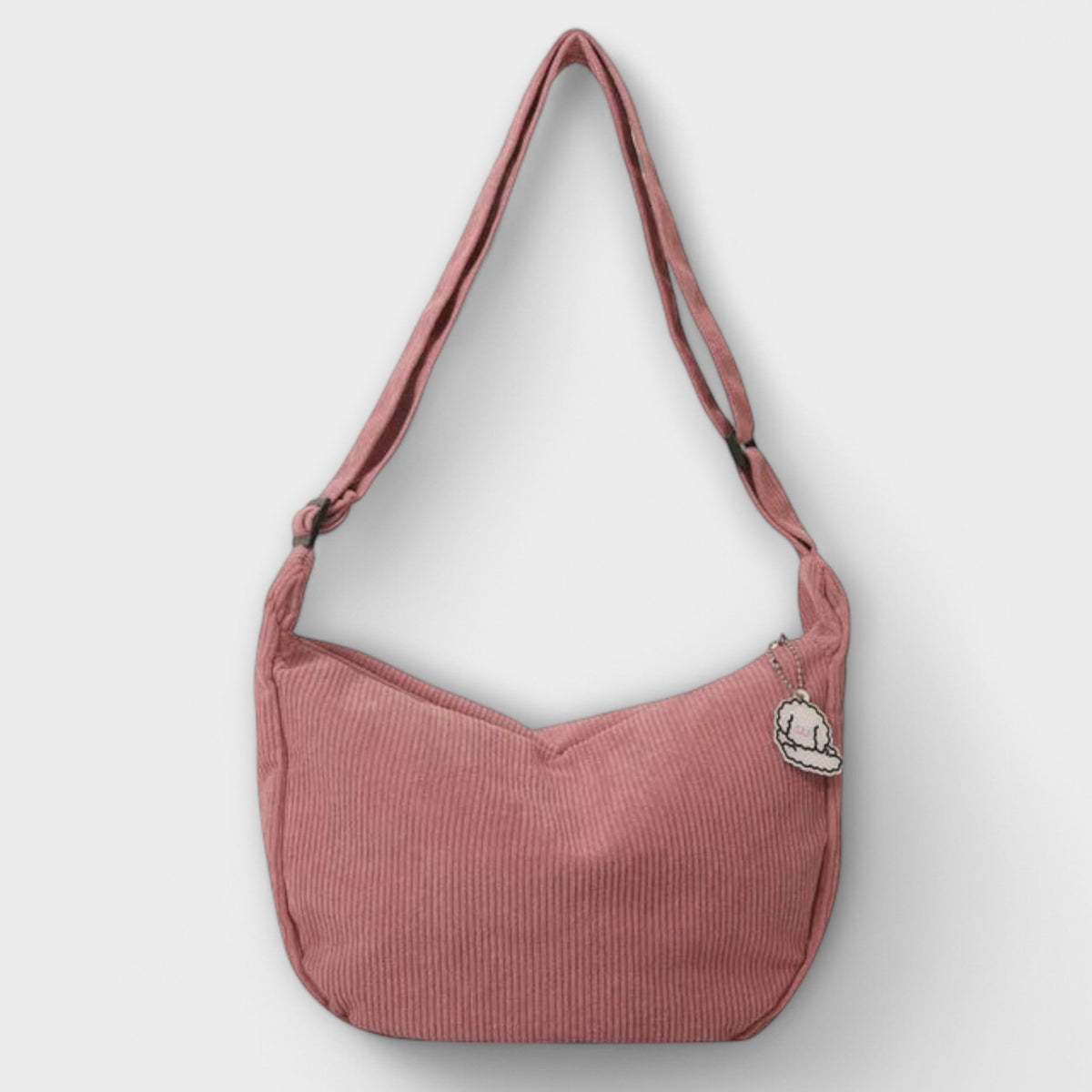 Alexa women’s shoulder bag, dusty pink corduroy hobo shape with cloud charm patch
