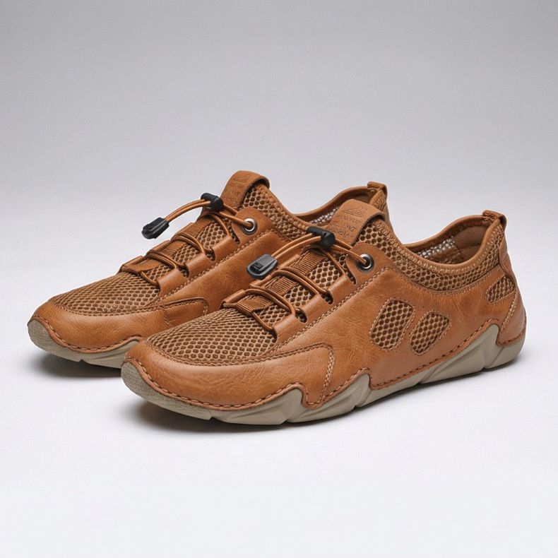 Scarpe da uomo marroni con lacci e tomaia traforata, suola beige ammortizzata
