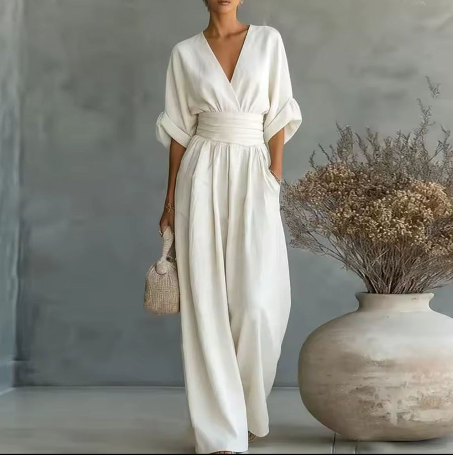 White wrap V-neck jumpsuit with tie waist and wide-leg pants, kimono sleeves