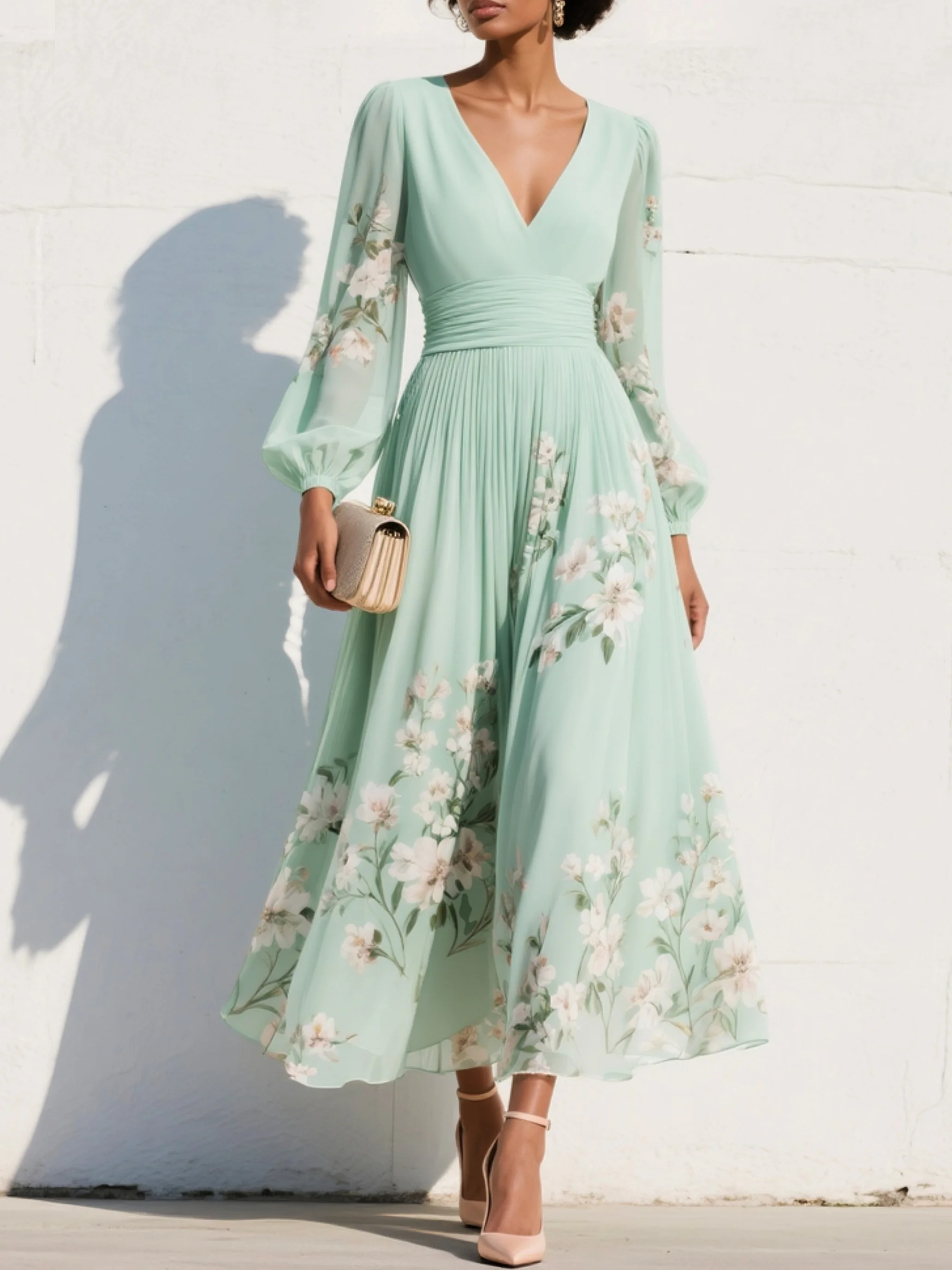 Vestito midi verde chiaro con scollatura a V, maniche a sbuffo e motivo floreale