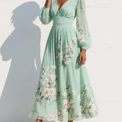Vestito midi verde chiaro con scollo a V, maniche lunghe a sbuffo e fiori