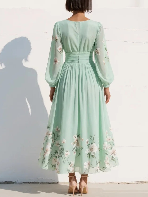 Vestito midi verde chiaro con motivo floreale e pieghe in vita, vista posteriore