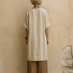 Linen tunic with short sleeves and brown wide-leg pants, back view