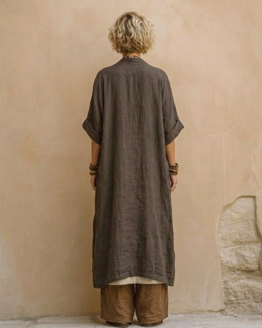 Dark gray short-sleeve tunic and brown wide-leg pants, back view