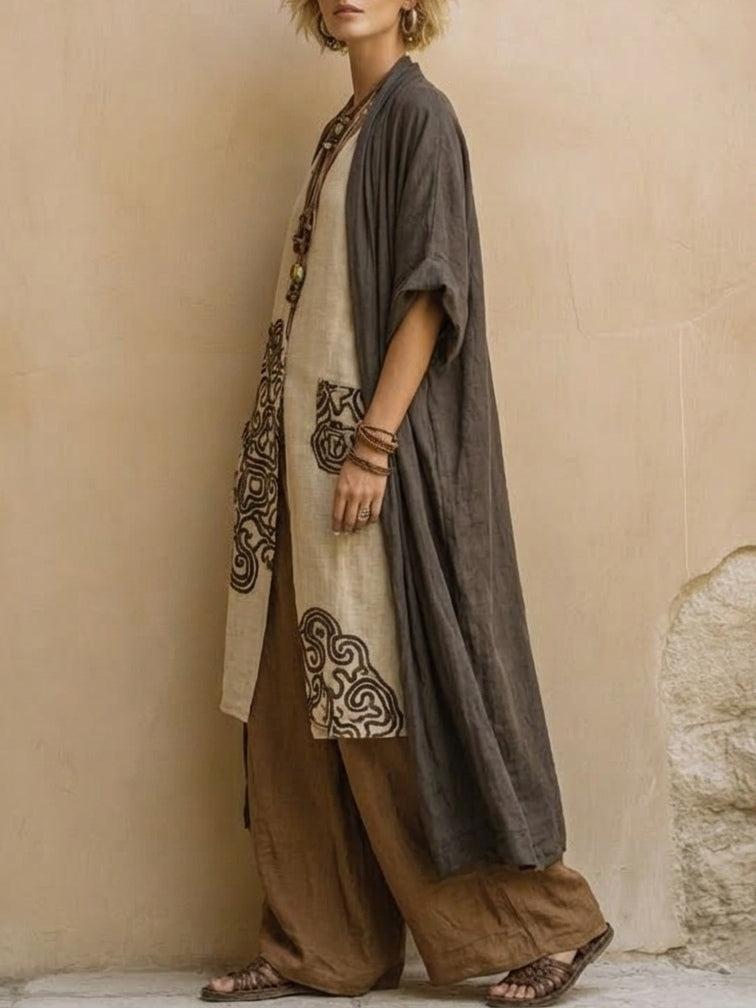 Dark gray linen kimono with tribal print panel and brown wide-leg pants, side view