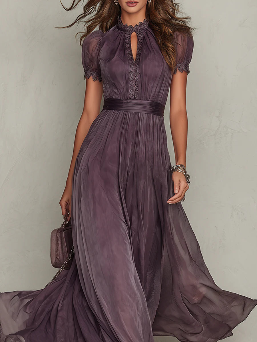 Abito maxi viola in tulle con scollo a goccia e maniche corte a sbuffo