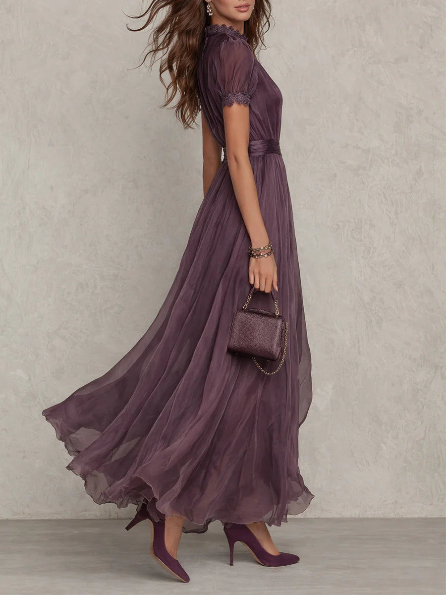 Abito maxi viola in tulle con maniche a sbuffo e gonna svasata, cintura in vita