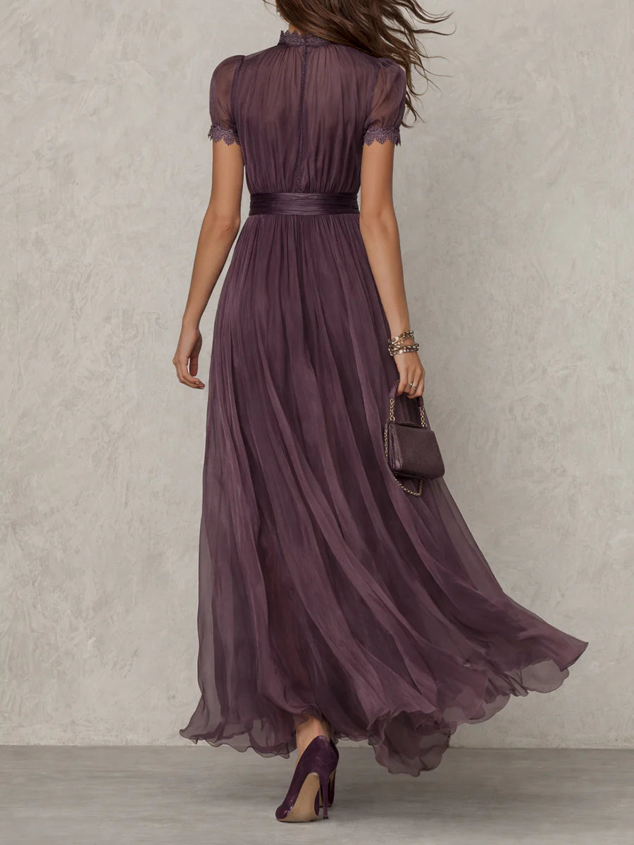 Abito maxi viola in tulle con cintura in vita e gonna ampia, vista posteriore
