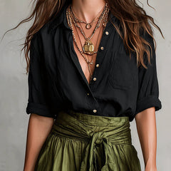 Black blouse top and olive green midi skirt two-piece set, close-up neckline and waist