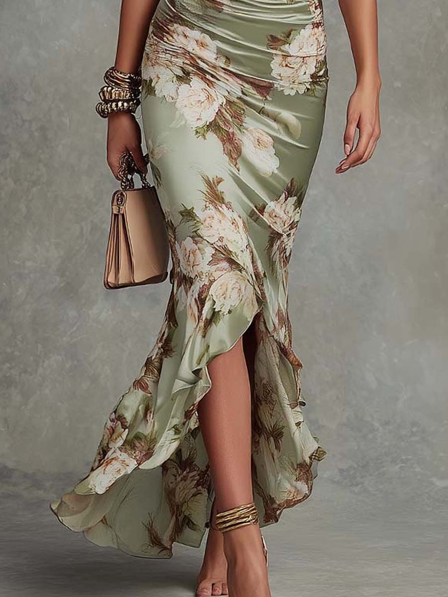Abito lungo verde con stampa floreale, scollo a V e gonna a balze con spacco