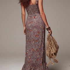 Grayish-purple floral maxi dress with ruched waist and ruffled hem, front slit