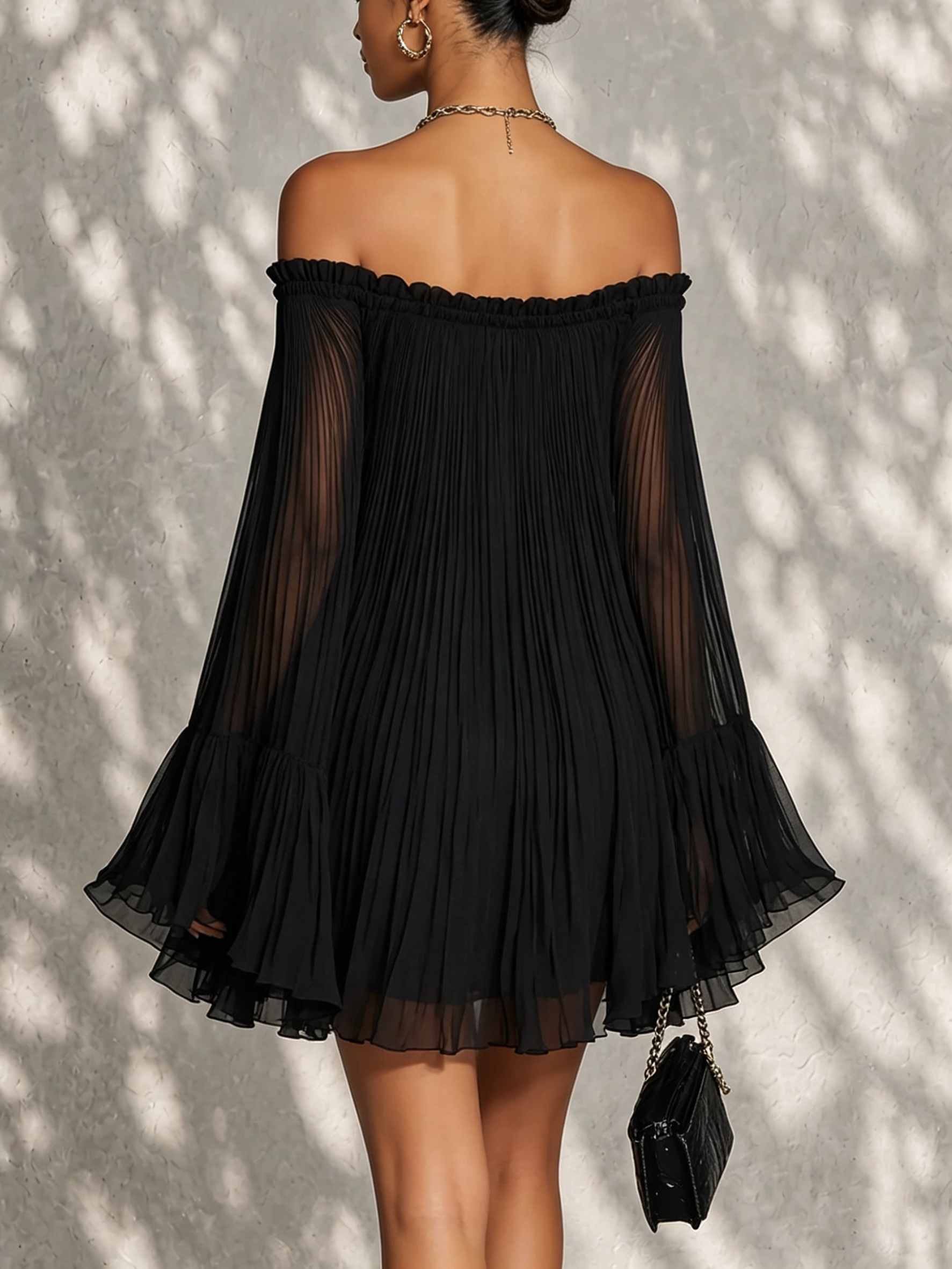 Black off-shoulder ruffle-sleeve midi dress, back view, pleated tiered hem