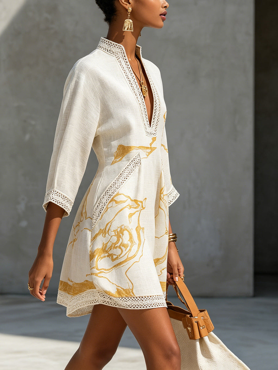 Ivory lace-trim V-neck midi dress with gold abstract print and three-quarter sleeves